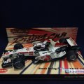 セカンドハンド品●PMA1/43 [Rising Sun] HONDA RA106 （R.バリチェロ）#11