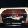 新品正規入荷品●burago1/43 RED BULL RB21 JAPANESE GP (角田裕毅）#22 ※アクリルケース＆ドライバーフィギュア付