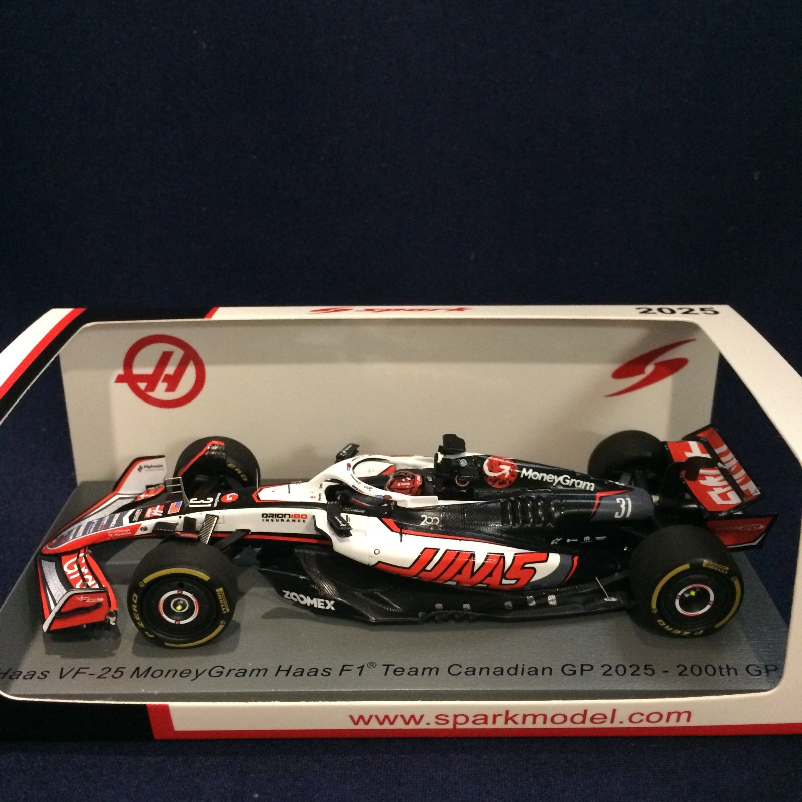 画像1: 新品正規荷品●SPARK1/43 HAAS MONEYGRAM VF-25 200thGP CANADIAN GP 2025 (E.オコン）#31